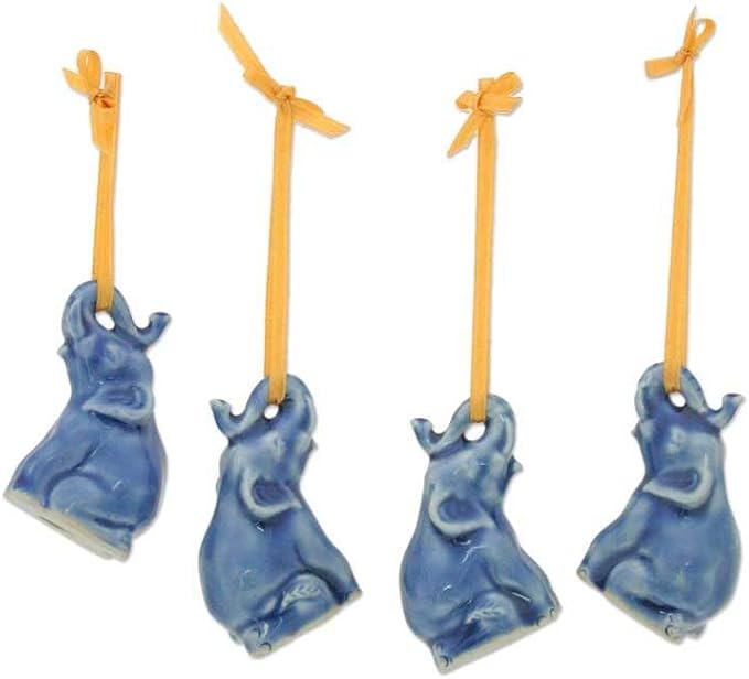 NOVICA Artisan Handmade Celadon Ceramic Ornaments Christmas Set of 4 Blue Thailand Holiday Decor Animal Themed Elephant [ 2.4in H x 1.2in W x 1.8in D] ' Blue Elephant Heralds' Set of 4