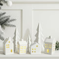 7 Pcs Ceramic Christmas Village Set 4 LED Light up White Ceramic Village Houses with 3 Xmas Trees Xmas Figurines for Farmhouse Rustic Indoor Home Mantel Table DIY Display Holiday Decoration