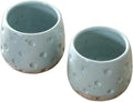 NOVICA Artisan Handmade Ceramic Teacups Turquoise Blue Indonesia Tableware Dinnerware Mugs [3.1in H x 3.1in Diam. 4 Oz.] 'First Snow' (Pair)