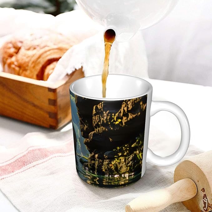 This Asian elephant in the water ceramic coffee mug features a classic design, making it perfect for home, office, and cafe use.