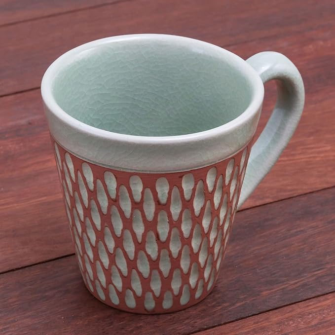 NOVICA Artisan Handcrafted Celadon Ceramic Mug Green Incised Brown Thailand Tableware Dinnerware Mugs Cups [cups 3.9in H x 5.25in W x 3.7in D 10 Oz.] ' Ginger Green Honeycomb'