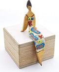 Small Sitting Woman Decorative Ceramic Sculpture Handmade and Handpainted with Multicolored Foc-Art Decoration. 3,94" x 2,36" x 6,69"