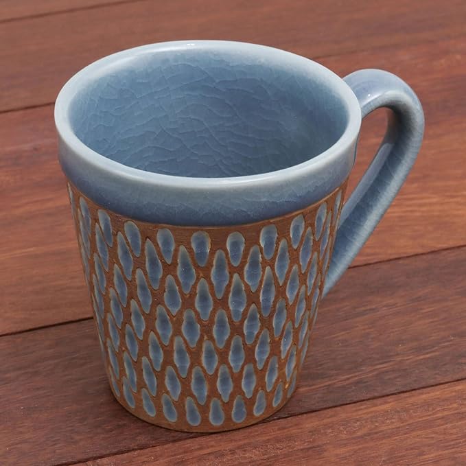 NOVICA Artisan Handcrafted Celadon Ceramic Mug Blue Incised Brown Thailand Tableware Dinnerware Mugs Cups [cups 3.9in H x 5.25in W x 3.7in D 10 Oz.] ' Ginger Blue Honeycomb'