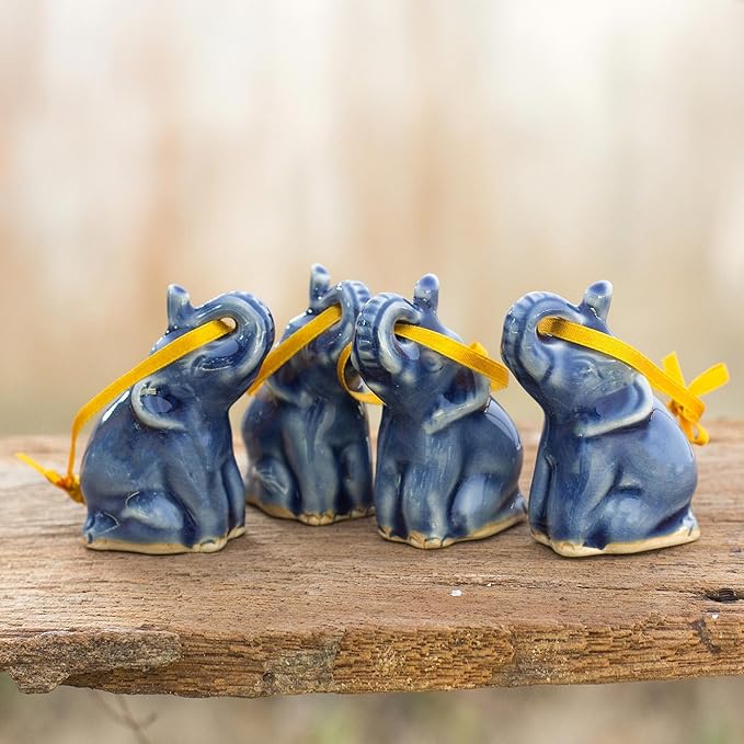 NOVICA Artisan Handmade Celadon Ceramic Ornaments Christmas Set of 4 Blue Thailand Holiday Decor Animal Themed Elephant [ 2.4in H x 1.2in W x 1.8in D] ' Blue Elephant Heralds' Set of 4
