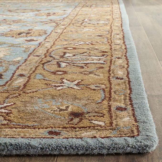 SAFAVIEH Heritage Collection Area Rug - 9' x 12', Blue & Gold, Handmade Traditional Oriental Wool, Ideal for High Traffic Areas in Living Room, Bedroom (HG958A)